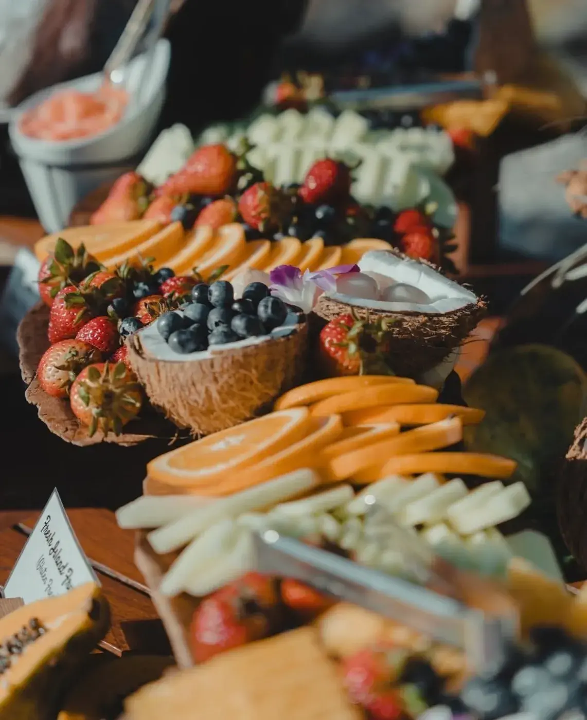 An Umekes grazing table of fruit, cheese and pupus set for an event