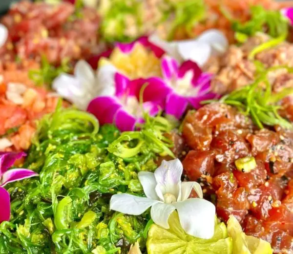 Umekes Kona catering spread of Hawaiian poke and platters