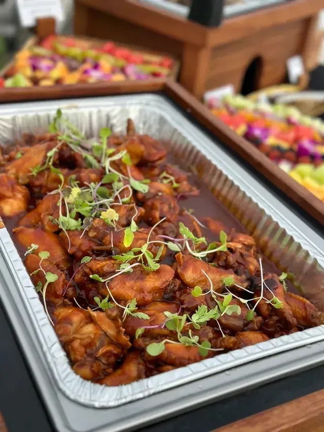 Hawaiian BBQ chicken wings with sesame and green onion