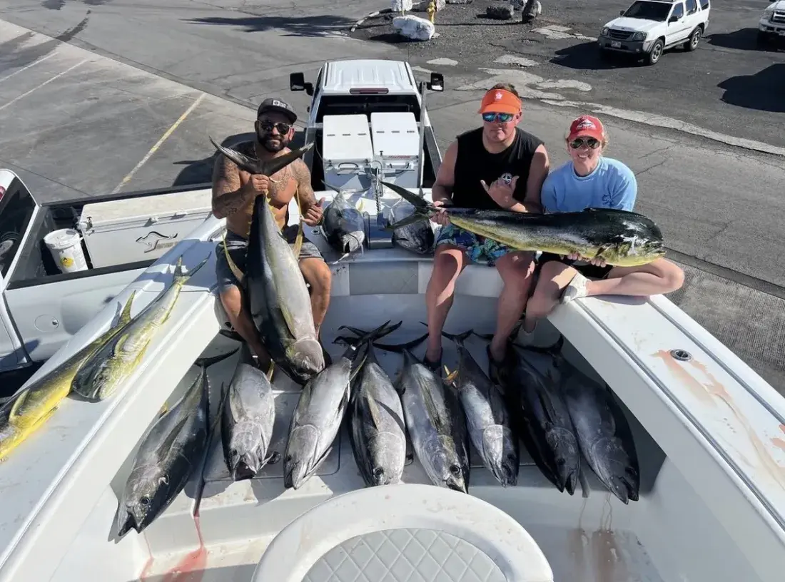 The Umekes crew on the dock with a morning's catch of ahi and mahi mahi