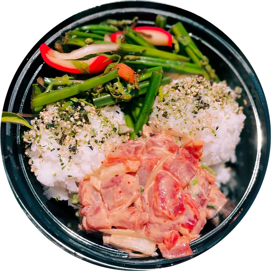 A bowl of Umekes ahi poke with rice, furikake and fresh greens
